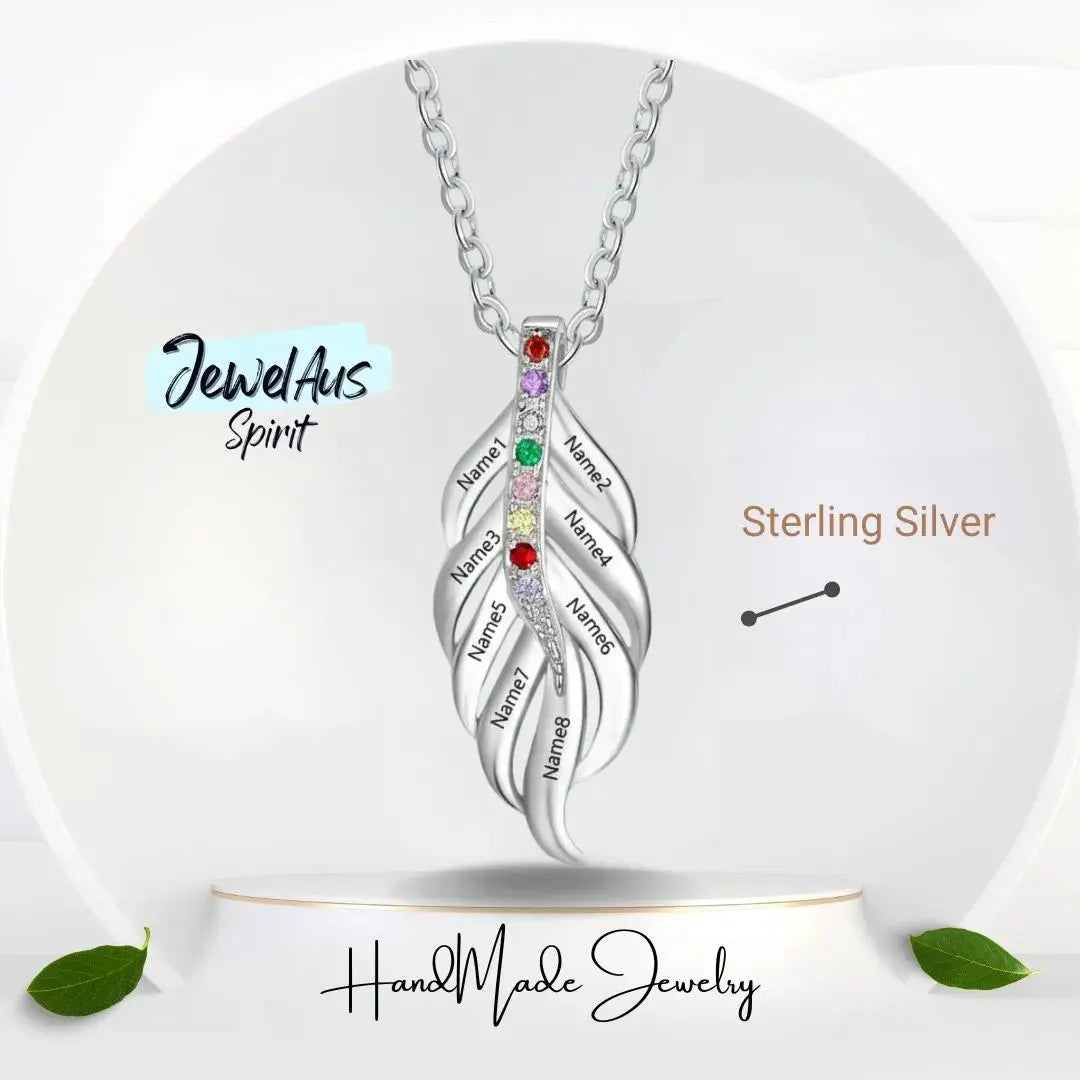Silver necklace with colorful stones on a white background, featuring 'JewelAus Spirit' branding.