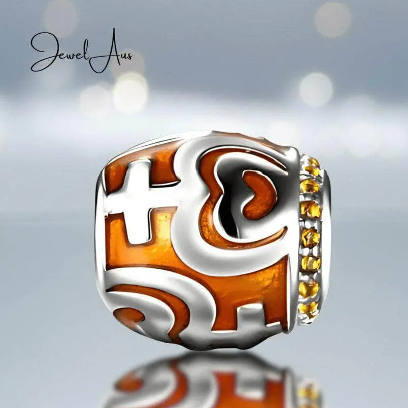 jewelaus CHARMS Orange Tribal Charm