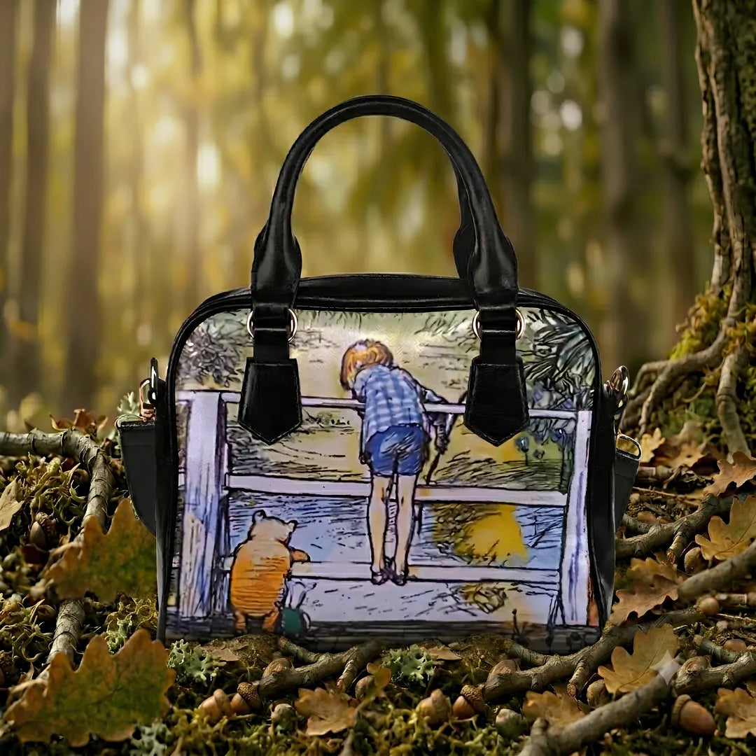 Handbag with a Winnie the Pooh design in a forest setting
